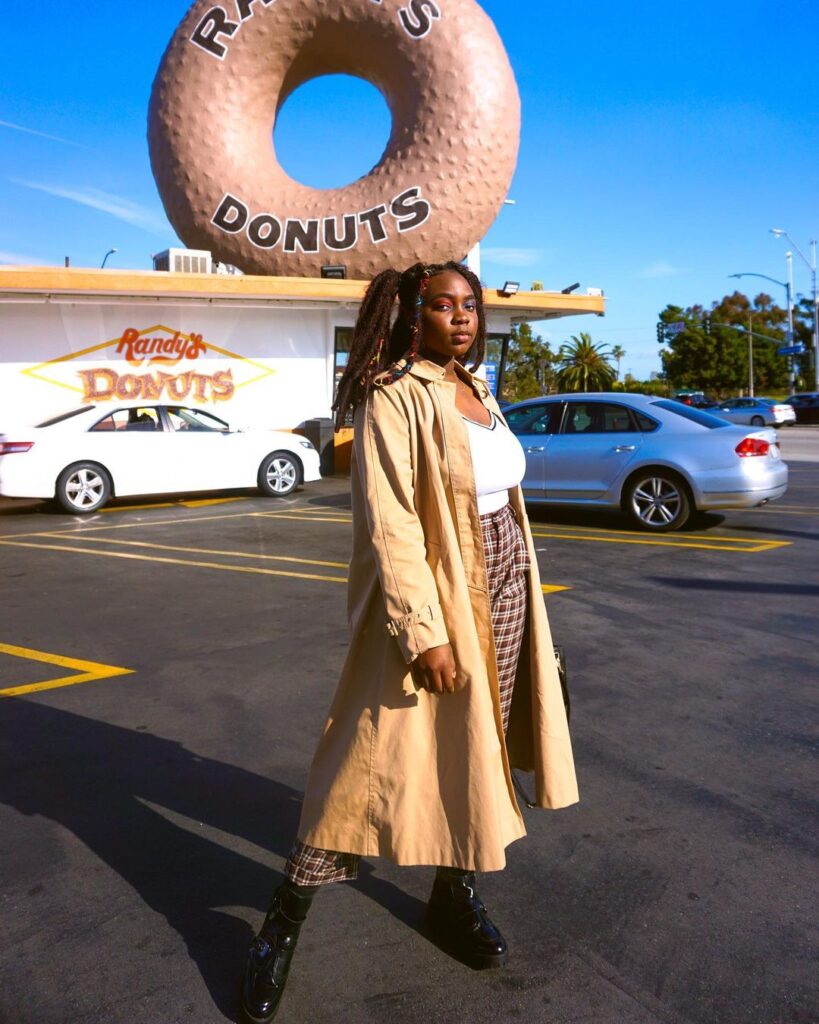 Outfit photo of a person wearing a vintage trench coat